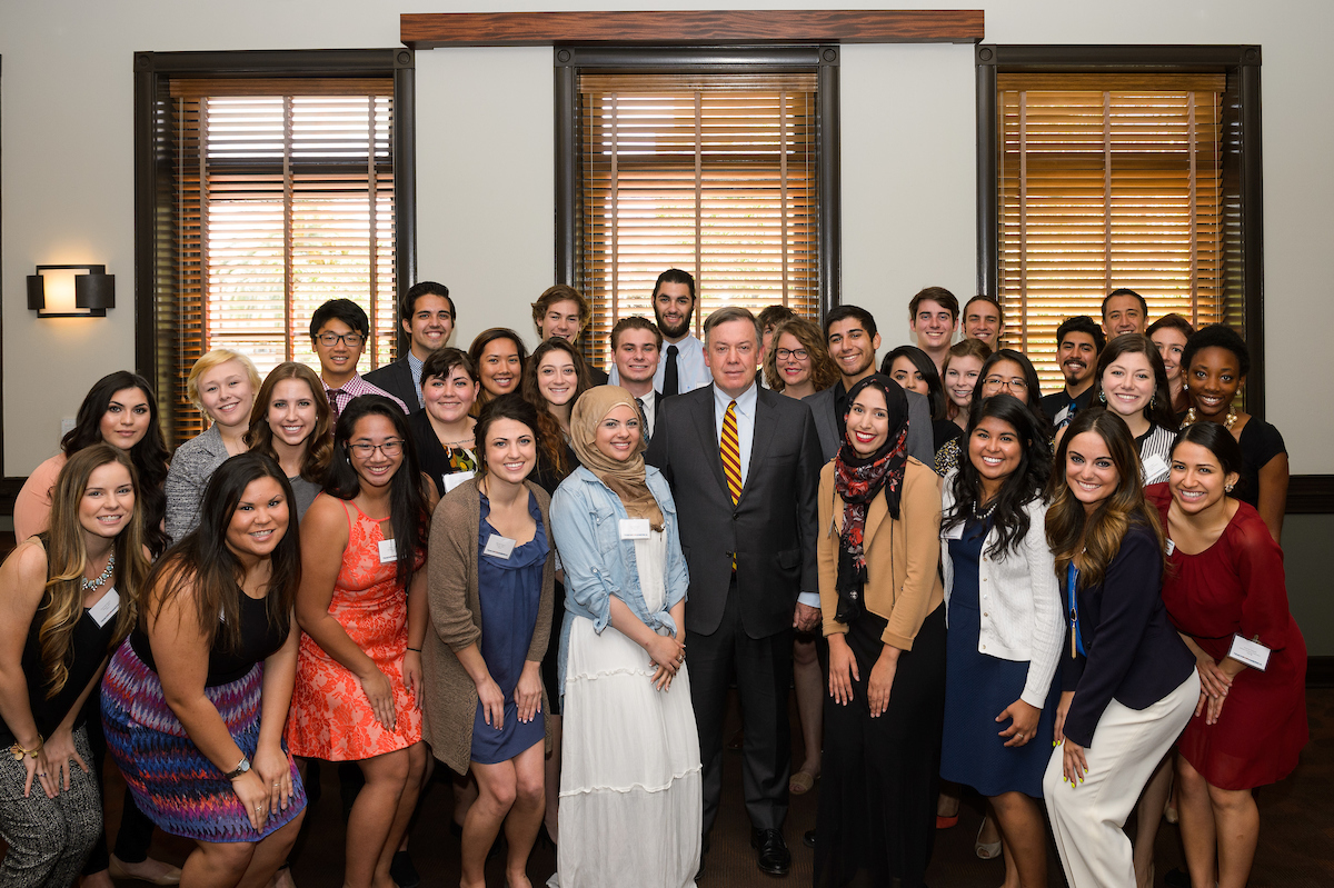 Photo of students at the Teach for America lunch with Michael M. Crow, President Arizona State University