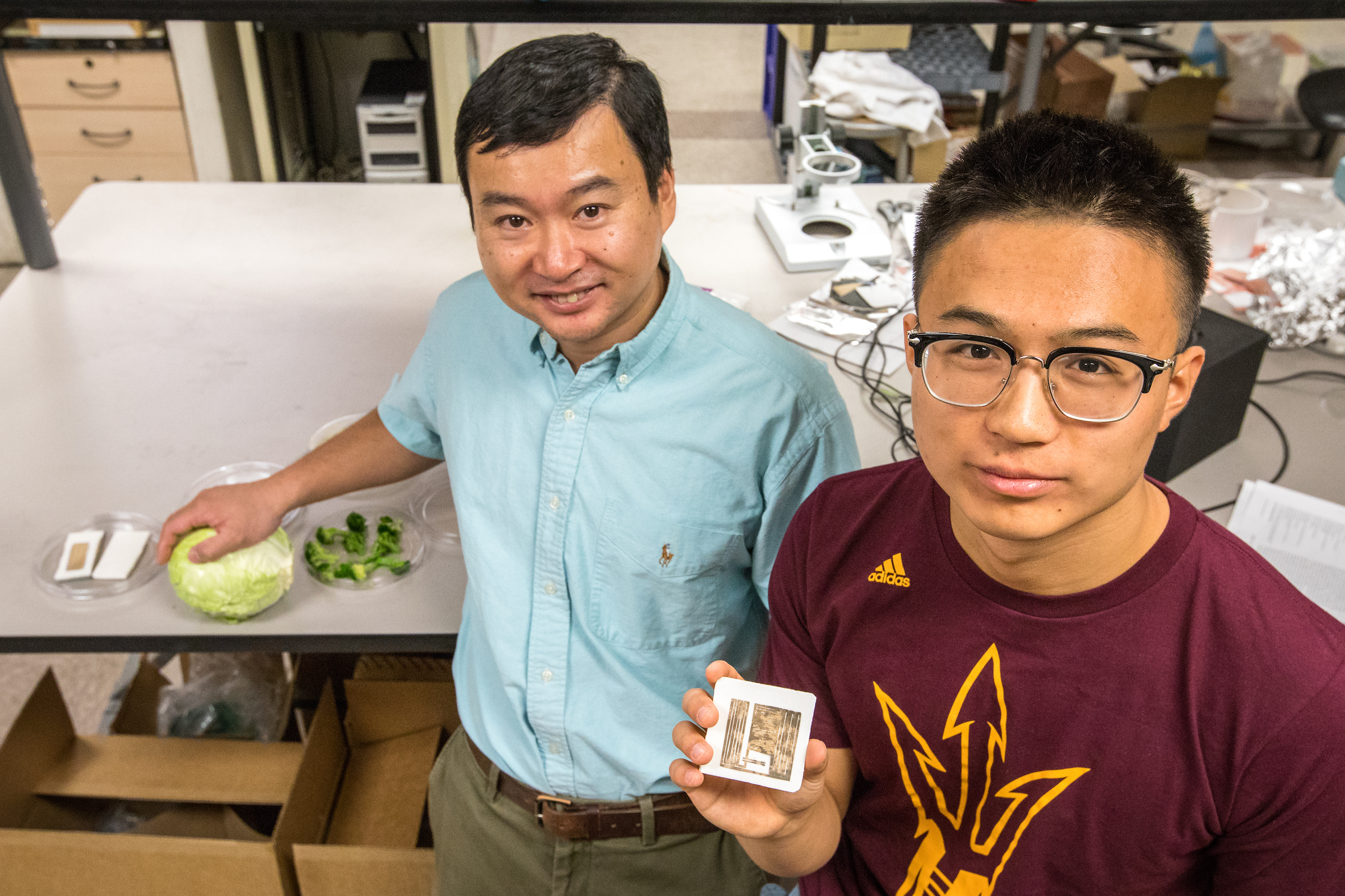 ASU professor and student in lab building edible electronics