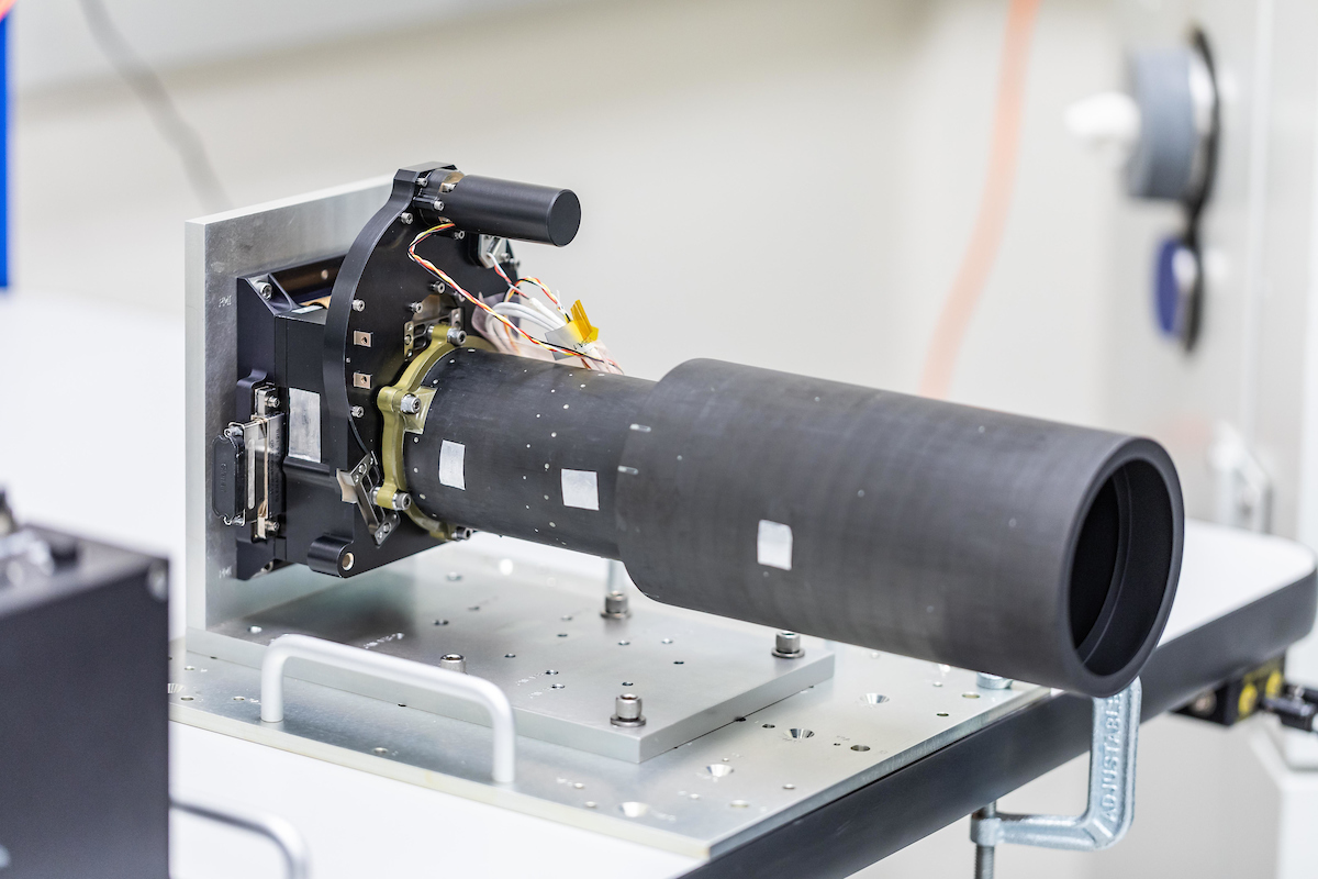 The Psyche mission's Multispectral Imager instrument sits on a table