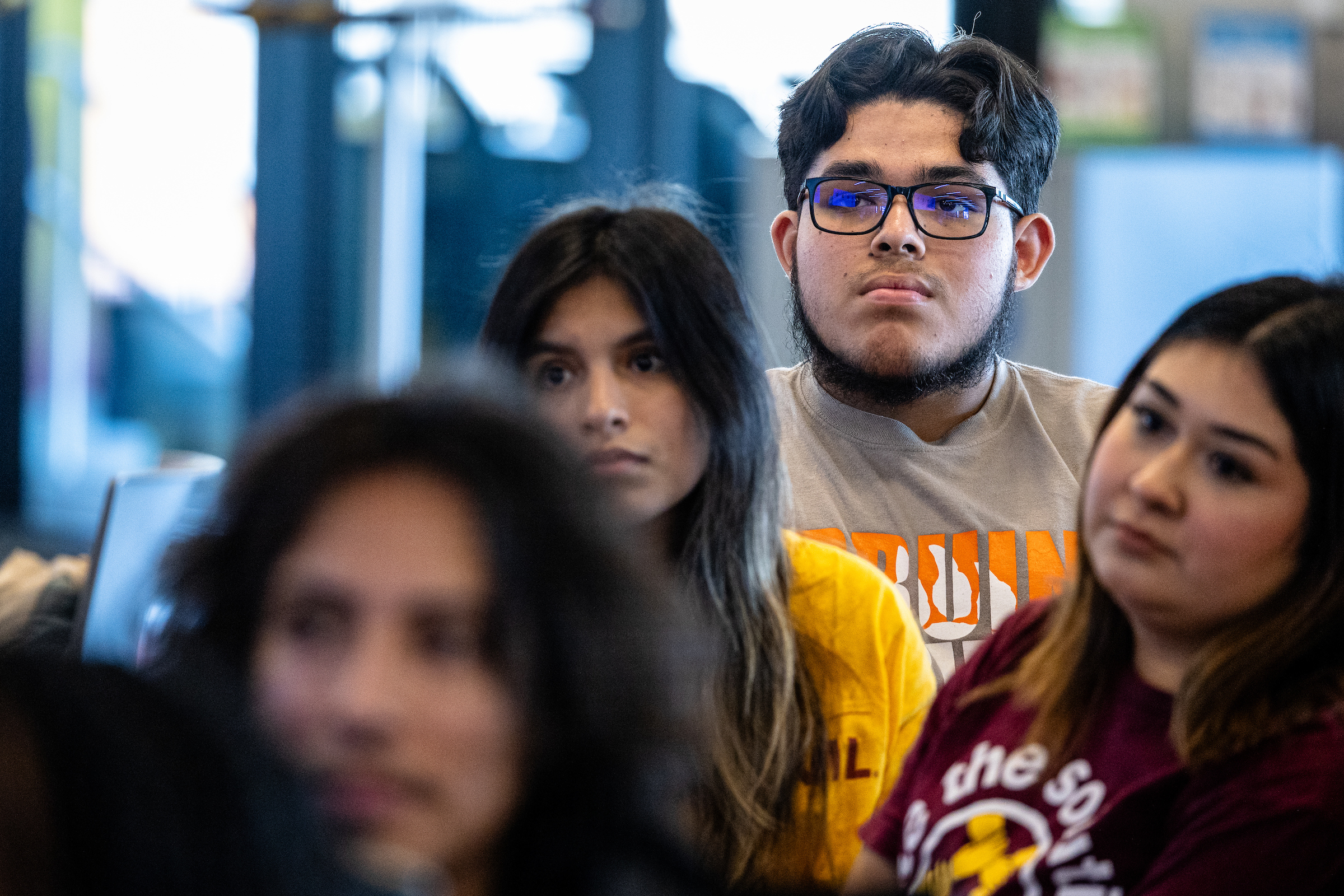 Students listening to panel