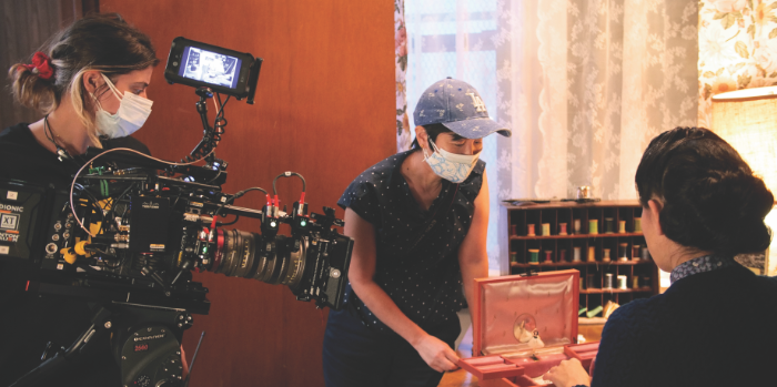 woman directing film