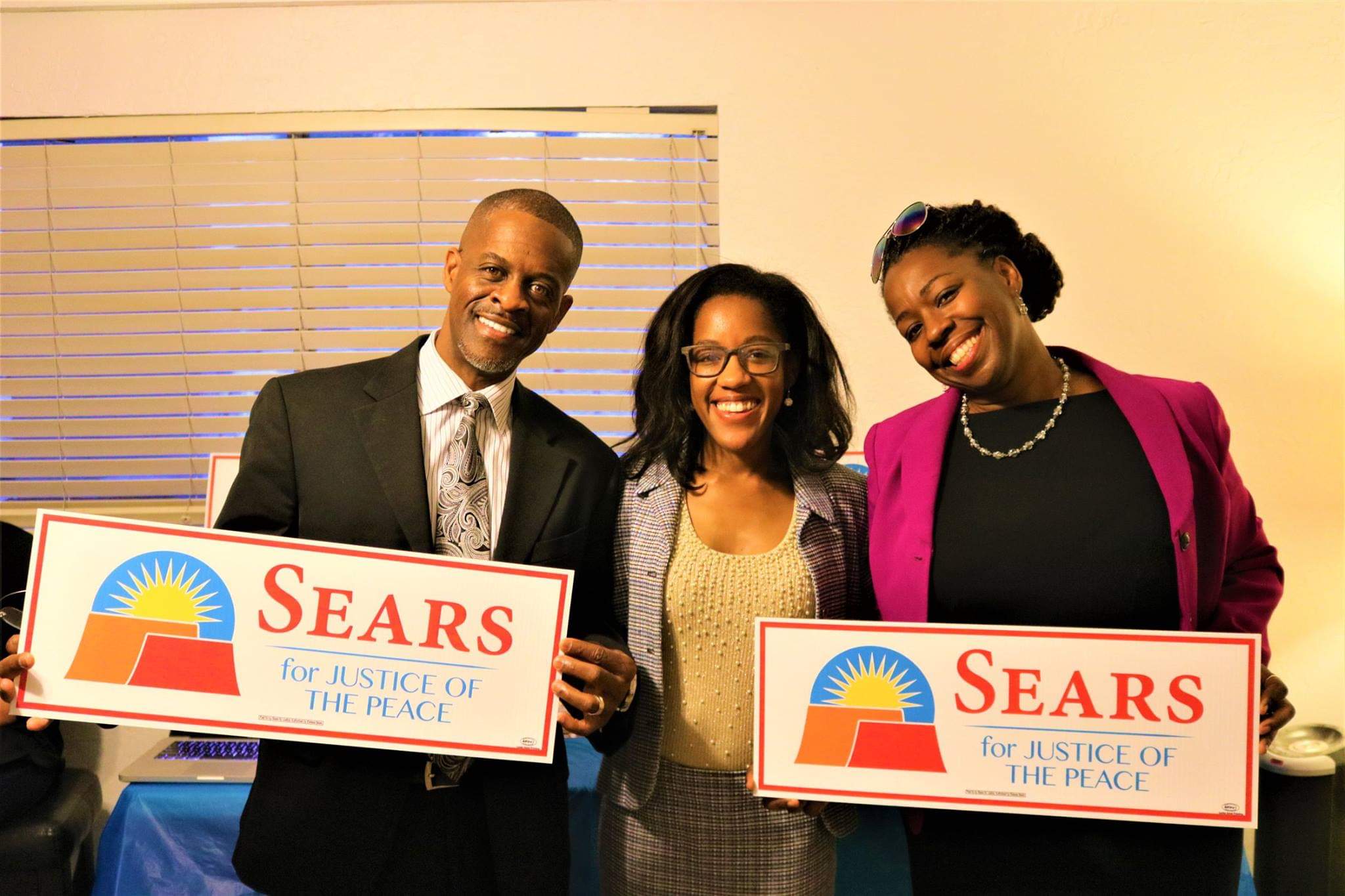 Elaissia Sears poses with her parents after her winning election to become a Justice of the Peace for the West Mesa Justice Court in November 2018.