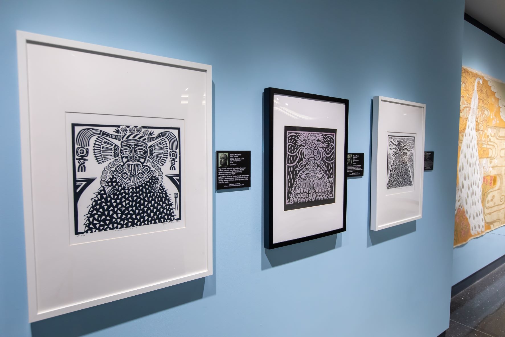 Linocut printmaking artwork from Marco Albarran is on display at the Phoenix Airport Museum