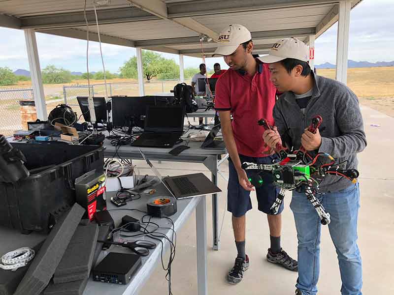 ASU students calibrate a drone at a 2019 competition
