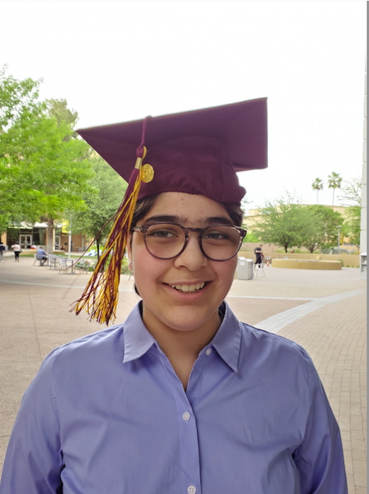 Ava Martinez in a maroon and gold graduation cap
