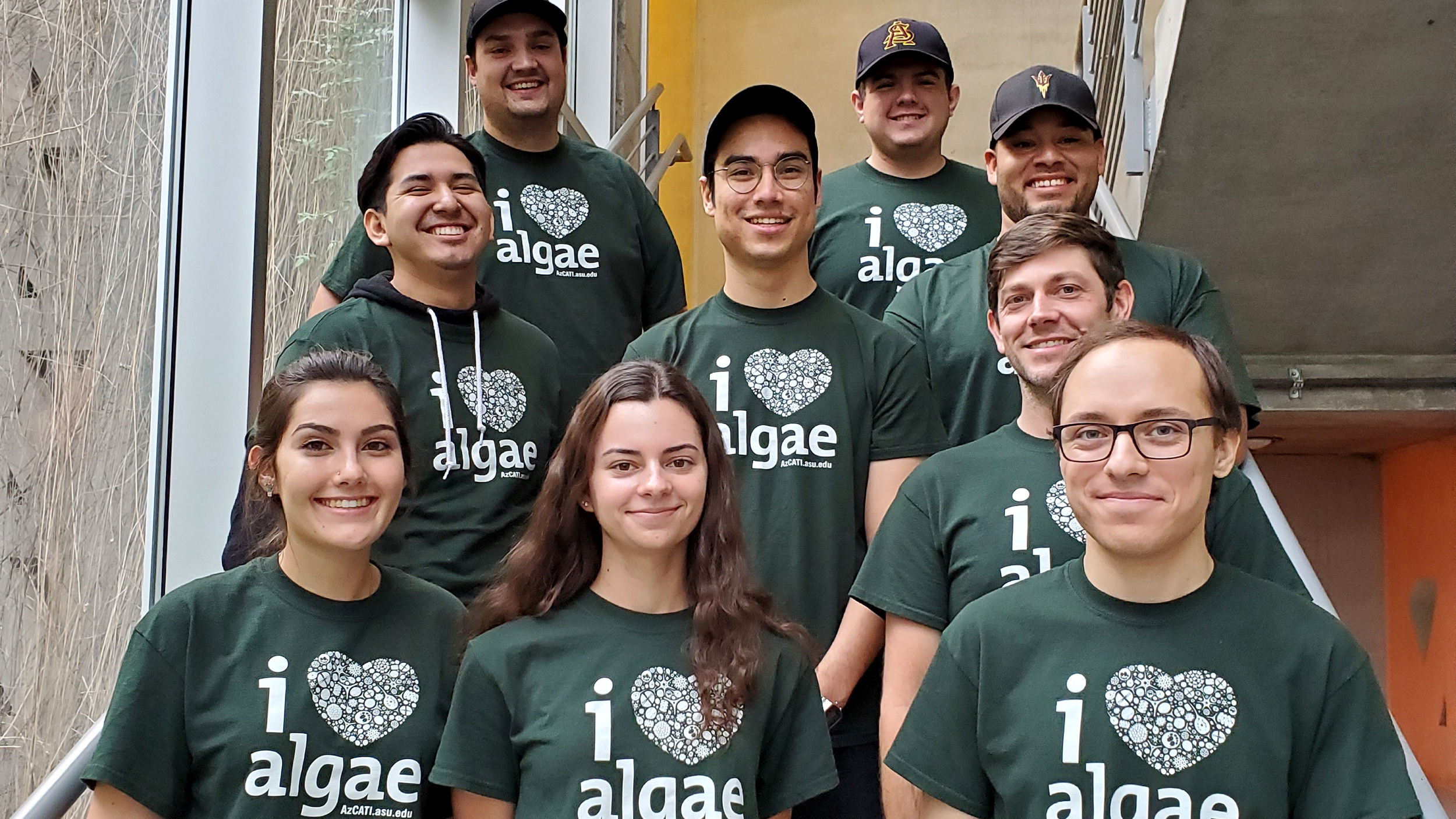 group of students wearing green I love algae shirts