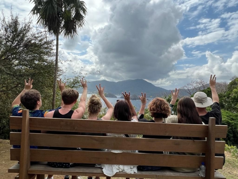 Photo of Barrett students flashing Forks Up in Tobago