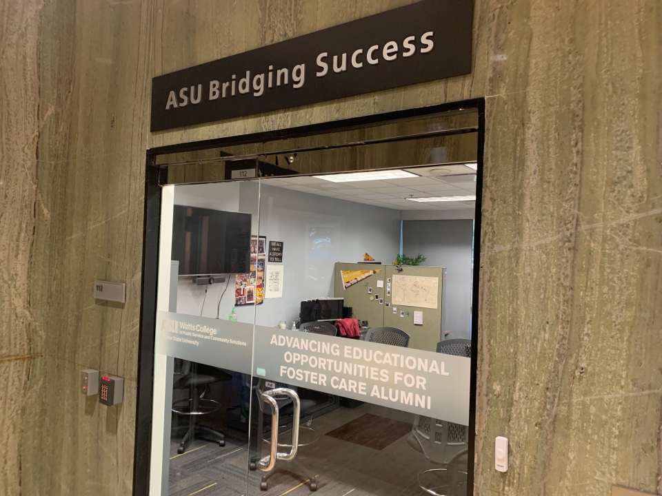Exterior of an office above which a sign read "ASU Bridging Success"