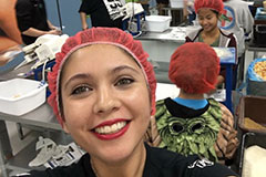 student volunteering with Feed my Starving Children
