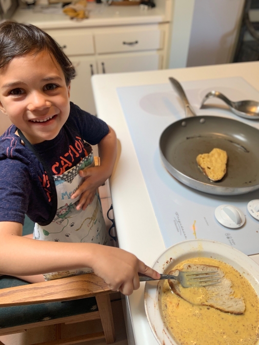 Five year old Henry cooking