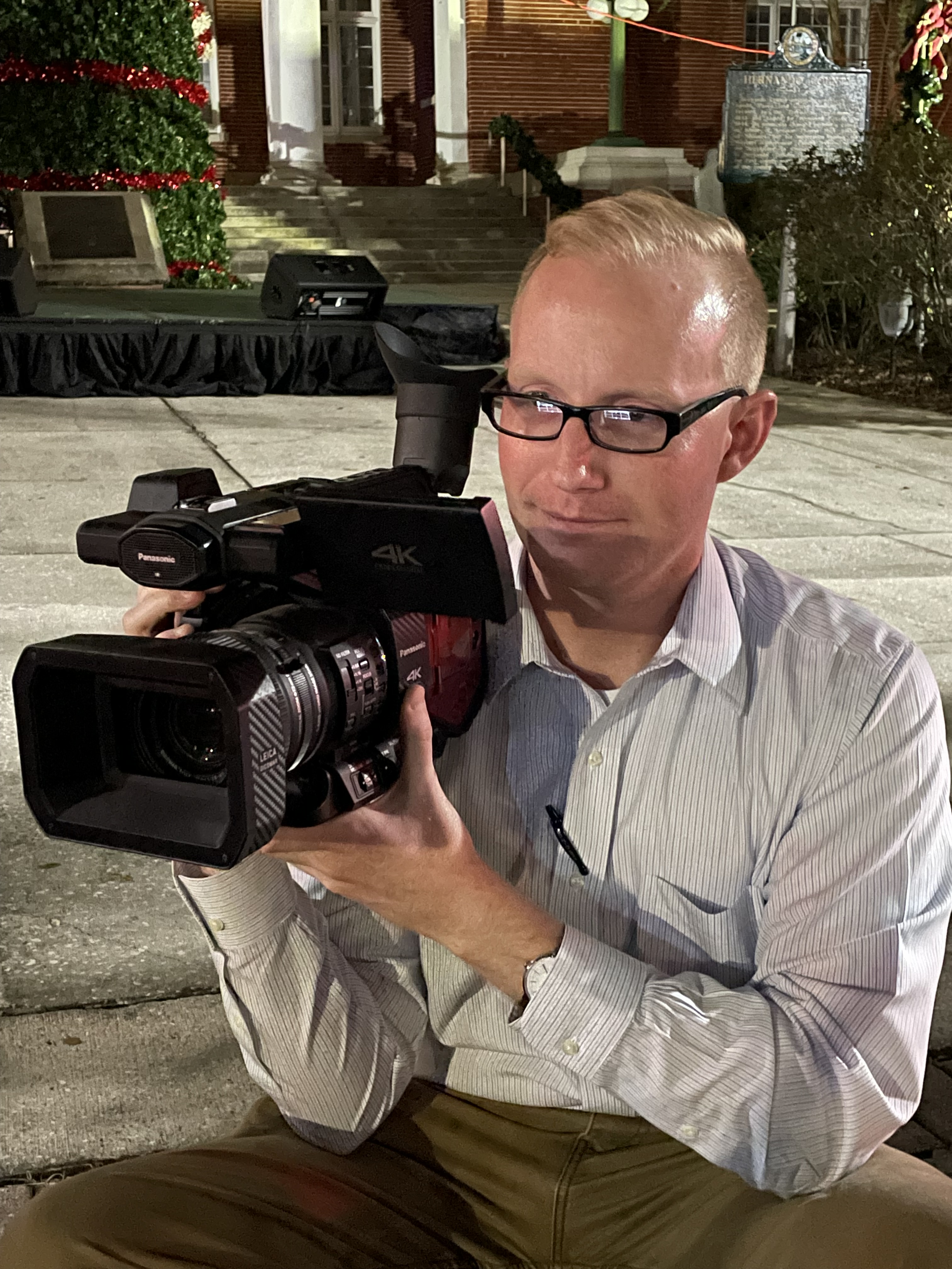 Matthew Wilcox holding a film camera