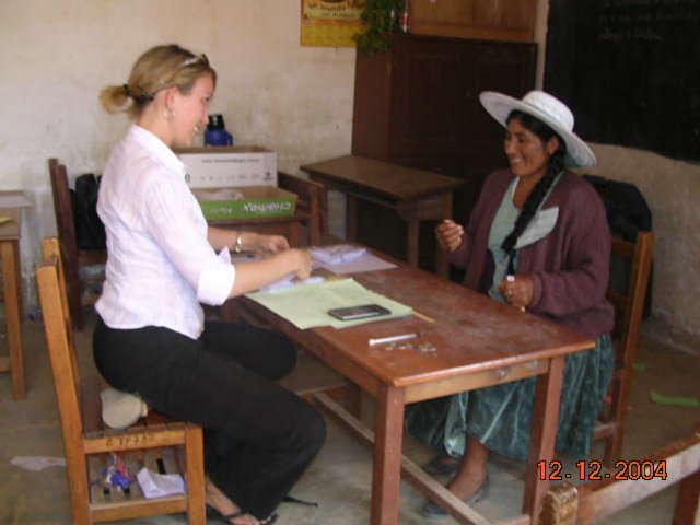 Amber interviews a locak in Bolivia 