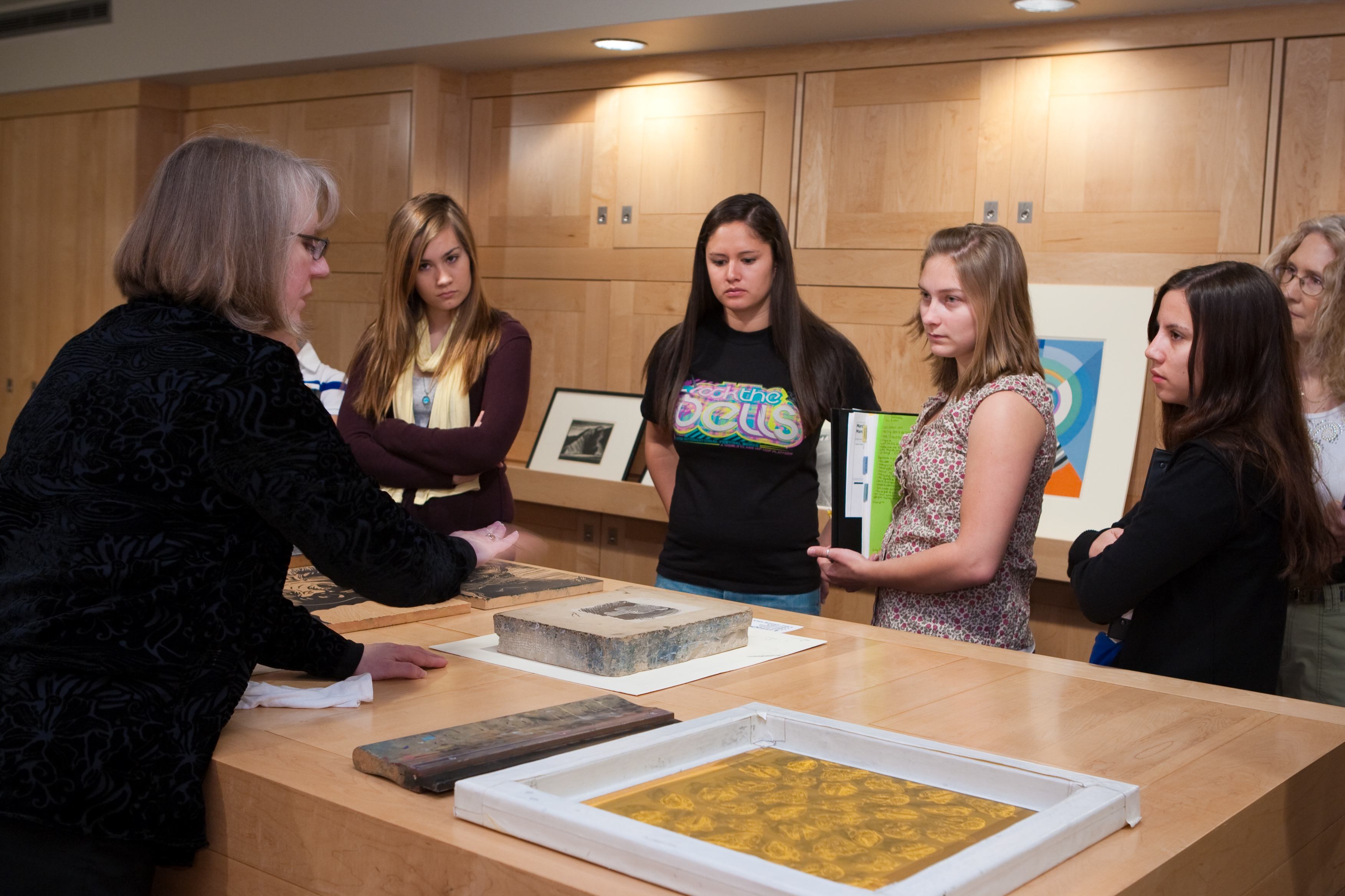 Curator of Prints Jean Makin interacts with students at the ASU Art Museum
