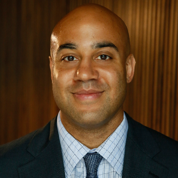 Bald man in tie and suit