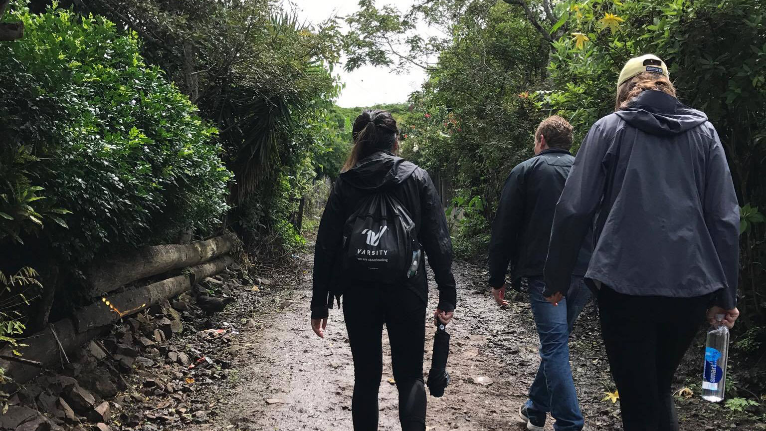 Students traversed muddy trails with the Mayo Clinic Global Medical Brigade