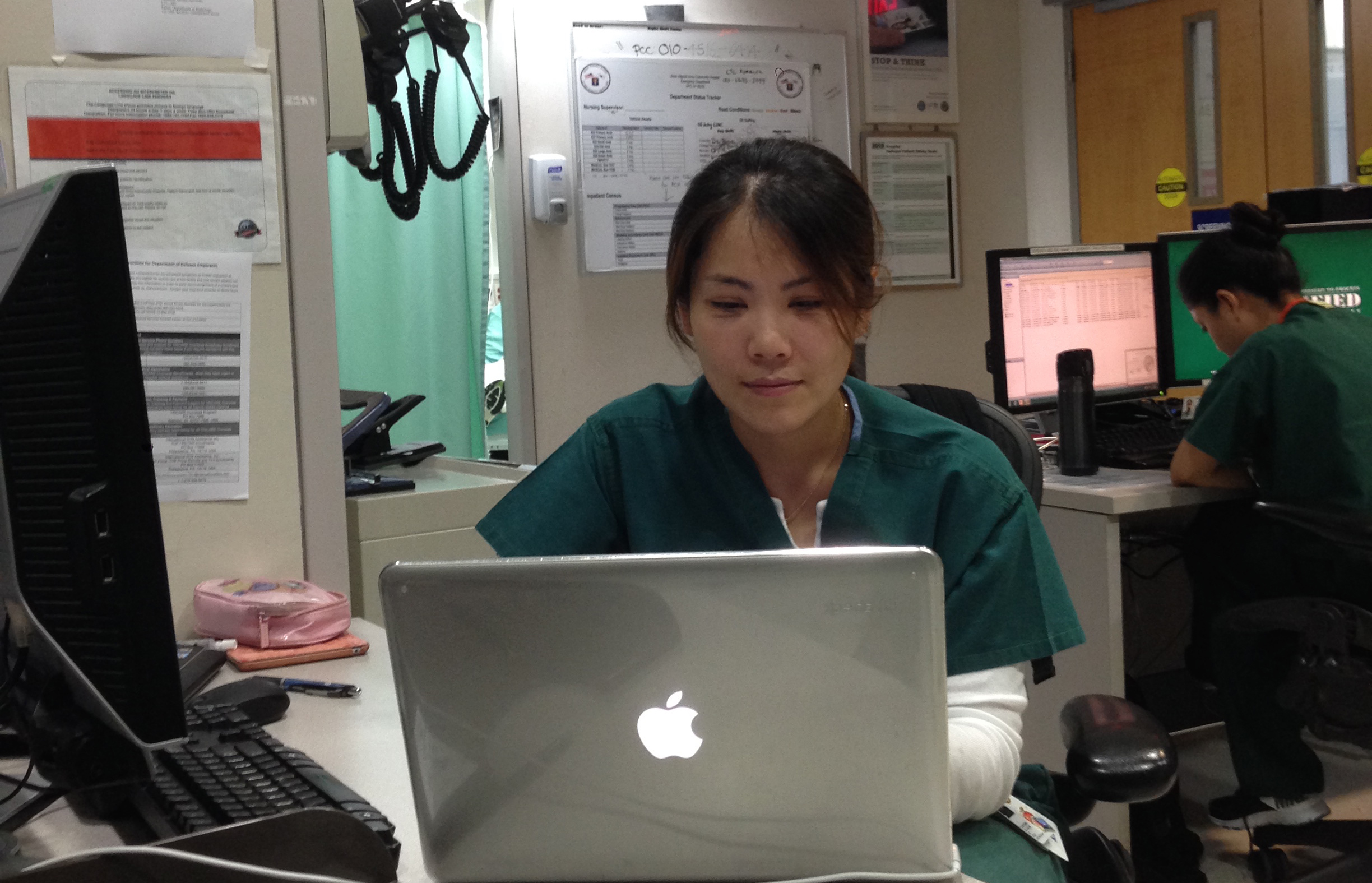 A photograph of Mi Young Lee, at the hopsital in which she works, in Seoul, Korea.