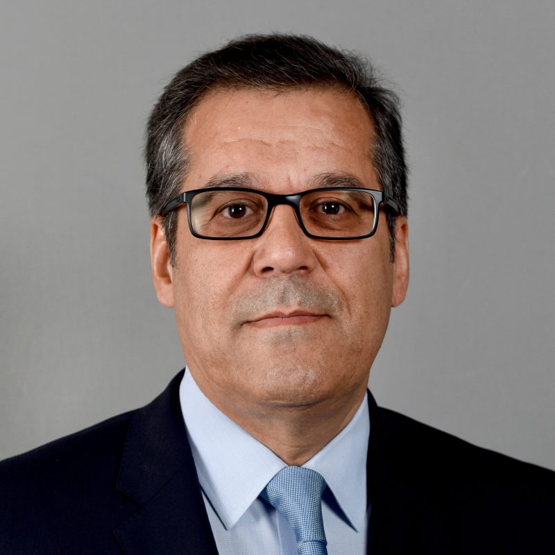 Man in tie wearing glasses
