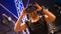 Girl wearing a virtual reality headset.