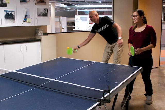 Steve Schramm and Stephanie Taylor compete in ping pong