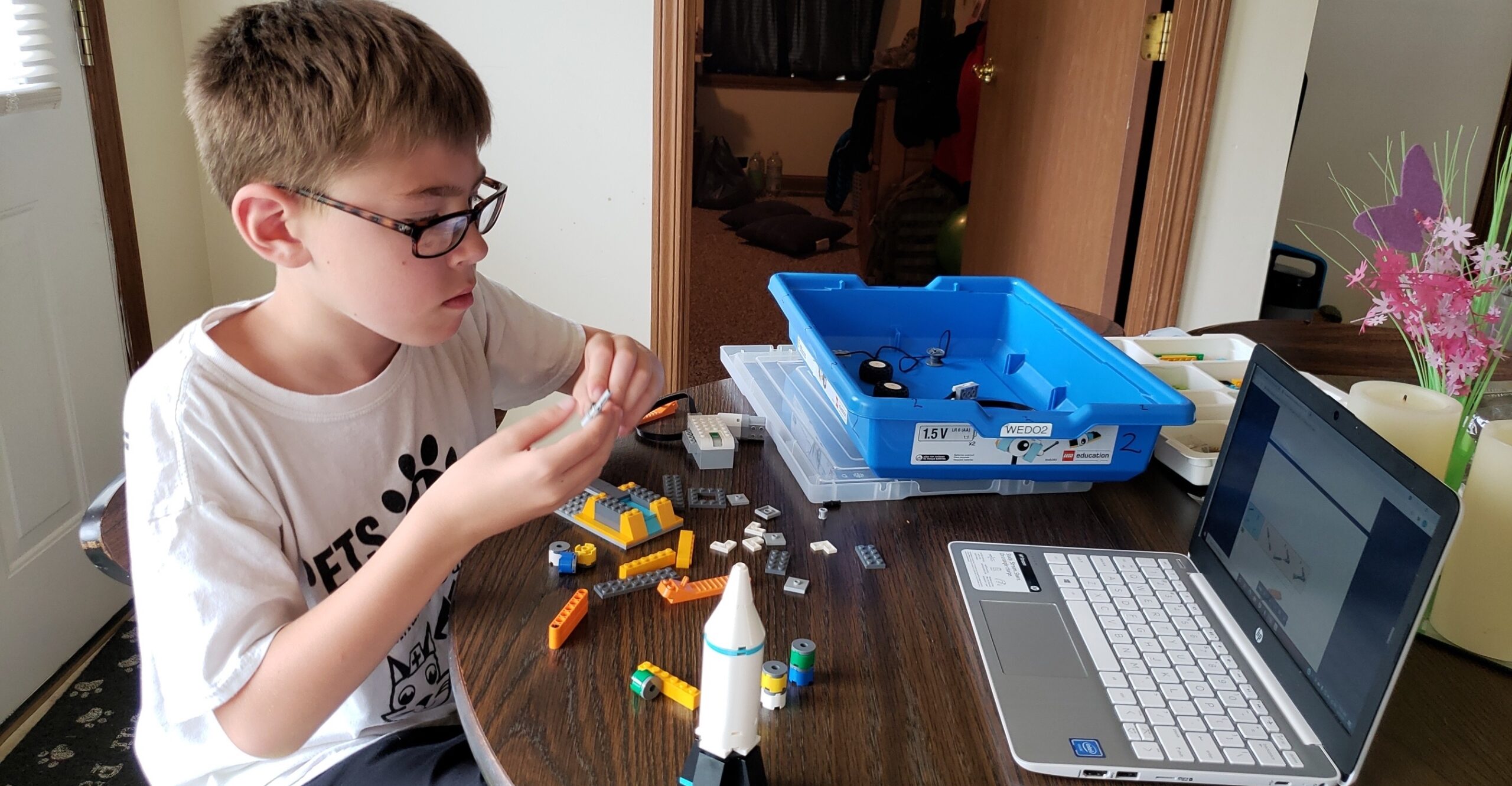 Fulton Academy camper building a LEGO Robot