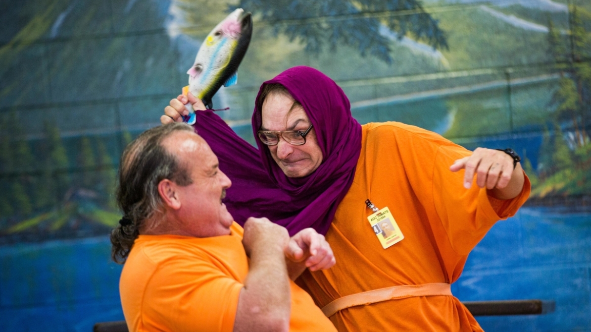 Prisoners performing a play.