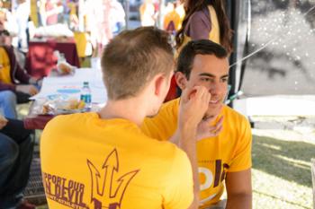 ASU students get their faces painted for Game Day