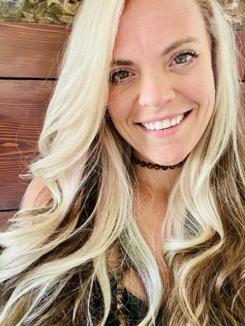 Selfie of blonde woman (McCall Langford) smiling