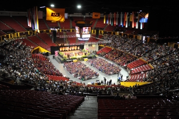 View from the upper concourse of Desert Financial Arena looking down at the Barrett Honors College convocation.