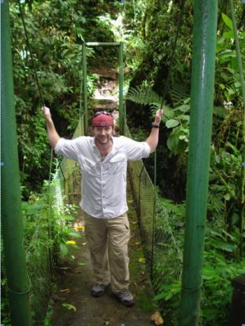 Ben Warner posing surrounded by greenery in Costa Rica