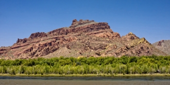 the Salt River running along the base of a mountainous terrain
