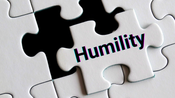 Puzzle with final piece that has "humility" on it