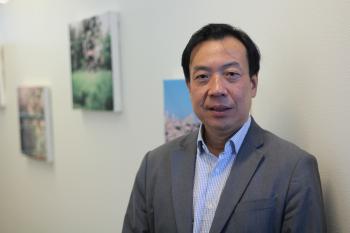Political science alumnus See Sang Tan