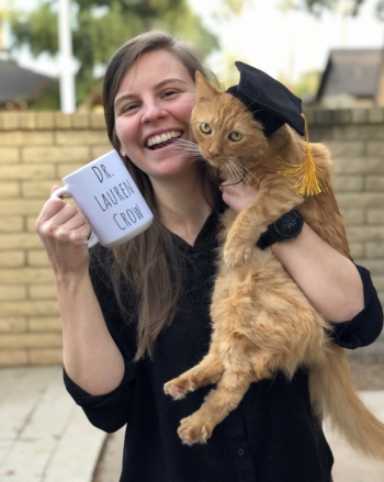 Crow celebrates after finishing her PhD