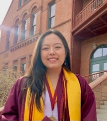 student's portrait in graduation gown