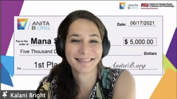 screen cap of Kalani Bright wearing headphones and smiling during a Zoom call in which she accepted the first place prize for Mana Studies in the AnitaB.org Pitch Competition