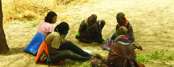 Sarah Mathew in the field with Turkana people