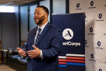 Man speaking at AmeriCorps event