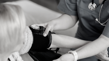 Stock image - Nurse taking a patient's blood pressure