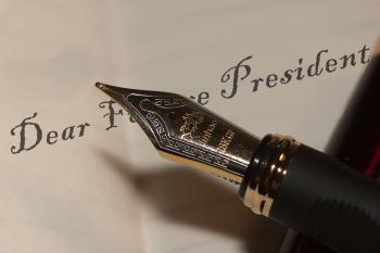 pen writing "Dear Future "President"