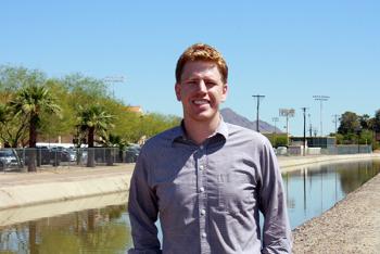 ASU student standing in front of a Phoenix canal