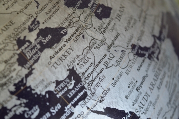 Closeup of a globe focusing on the Middle East