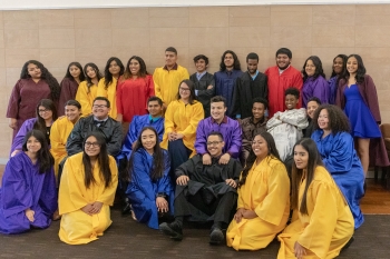 TRIO Upward Bound students pose in their graduation gowns in a spring 2019 celebration at ASU in Tempe