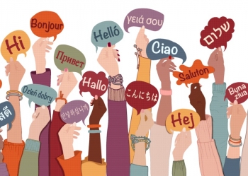 Illustration of hands holding speech balloons that say "hello" in several languages.
