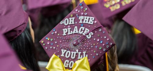 close-up of graduation cap that says "Oh the places you'll go"
