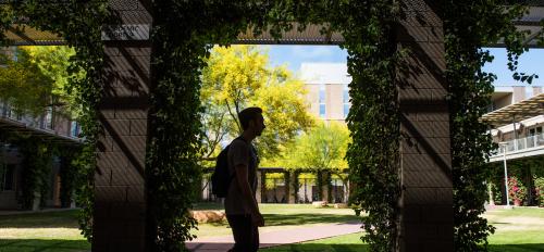 A student walks through the Barrett compound