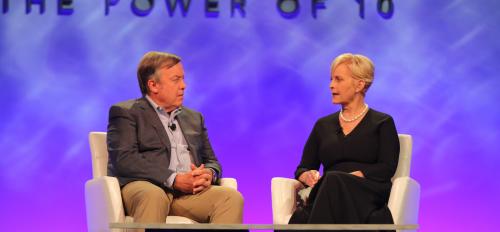 ASU President Michael Crow and Cindy McCain speak onstage