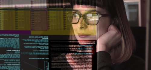 Woman looking at computer screen