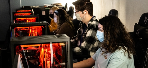 lineup of students playing on gaming computers