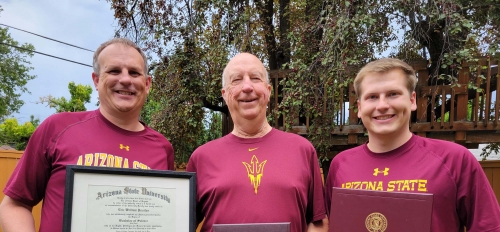 Eric Povilus (left), William Povilus (center) and Blake Povilus (right) pose for a photo with their diplomas from Arizona State University.