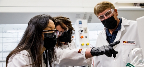 Graduate researchers Boer Liu and Clarissa Westover work with Professor Timothy Long in the ASU Biodesign Center for Sustainable Macromolecular Materials and Manufacturing.